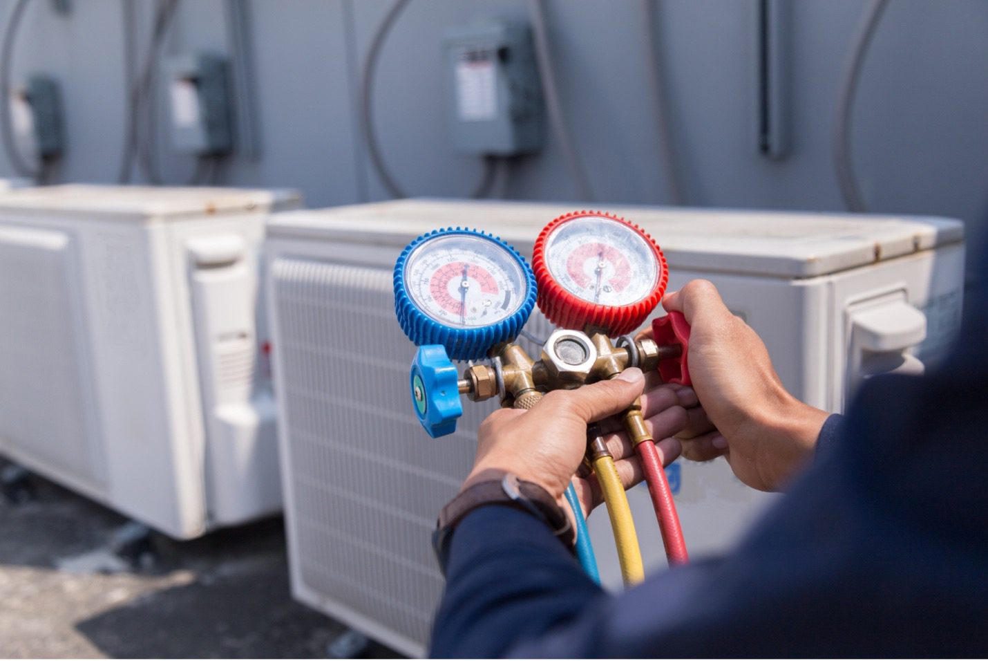 Manifold gauges during an HVAC service call