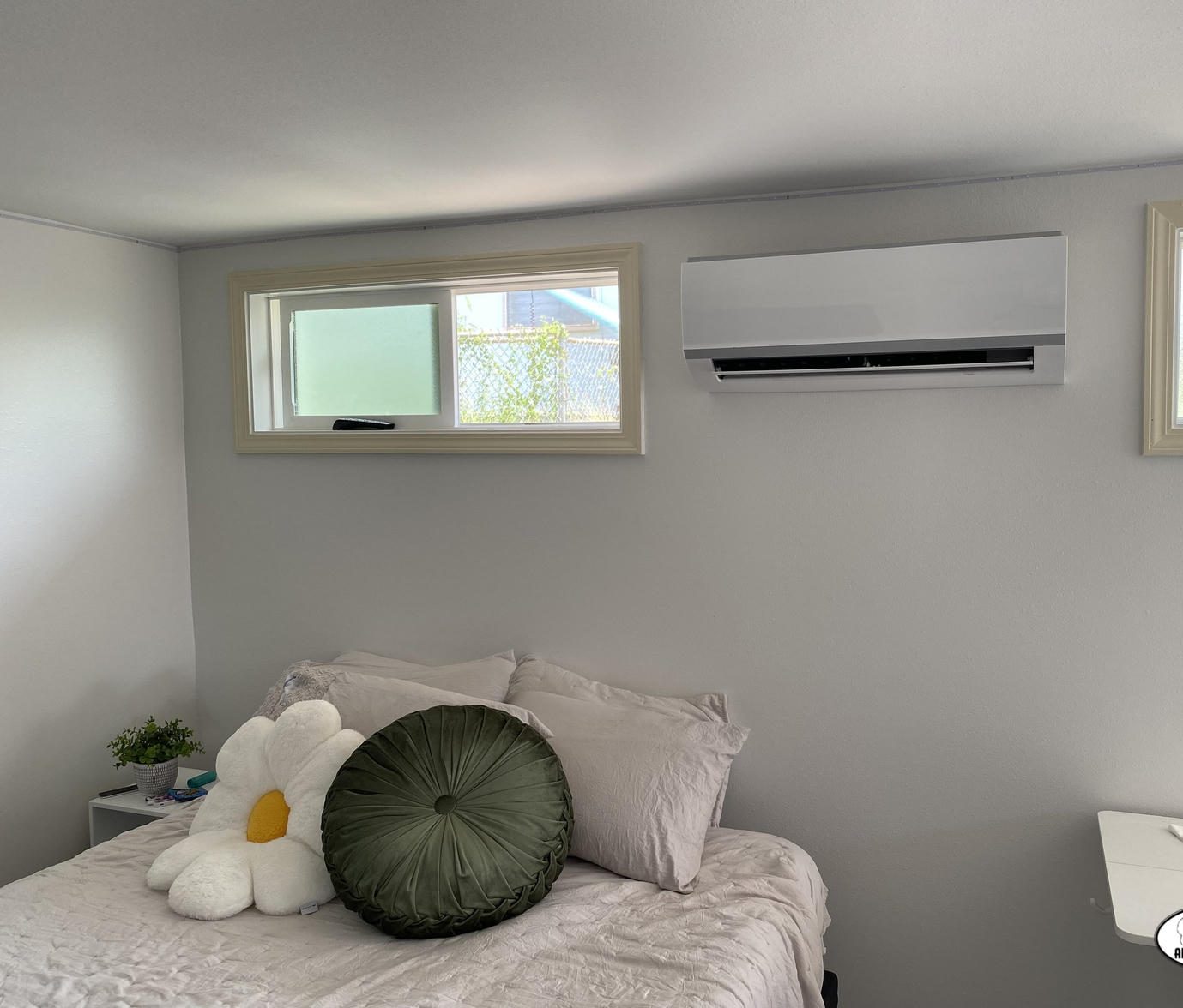 Ductless indoor unit on a bedroom wall